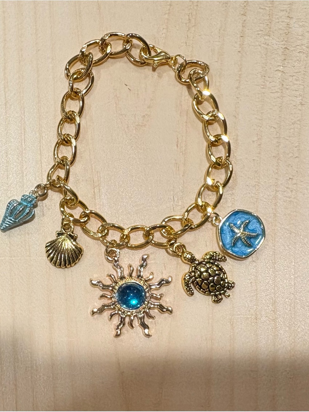 Gold-Tone Blue Sea Charm Bracelet with Turtle & Sun